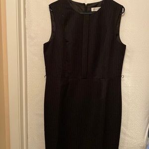 Fully Lined black dress.